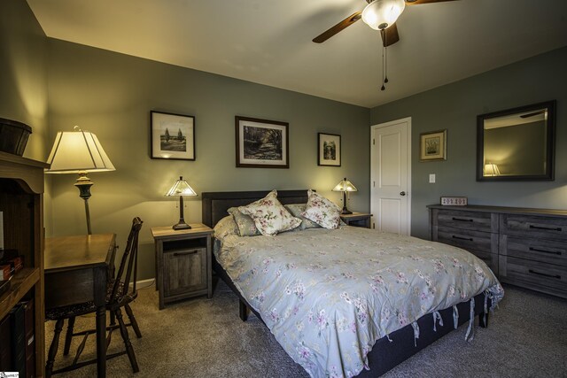 bedroom featuring baseboards, a ceiling fan, and carpet flooring