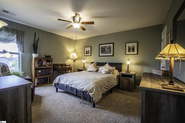 bedroom featuring carpet flooring and visible vents