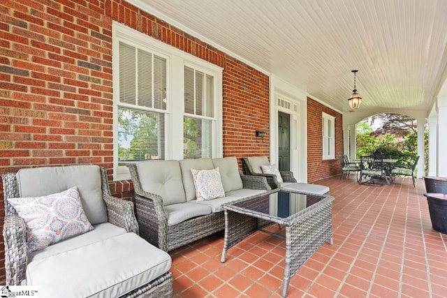 view of patio / terrace featuring an outdoor hangout area and covered porch