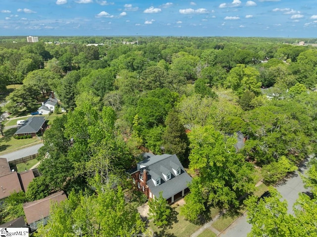 aerial view featuring a forest view