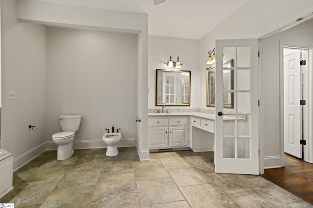 103 Greenleaf Ln, Easley, SC 29642 - full bath with vanity, baseboards, toilet, a bidet, and stone finish floor