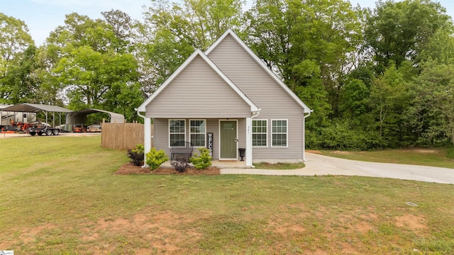 381 Deer Farm Pond Ln, Fair Play, SC 29643 - bungalow-style house featuring a front lawn, driveway, covered porch, fence, and a detached carport