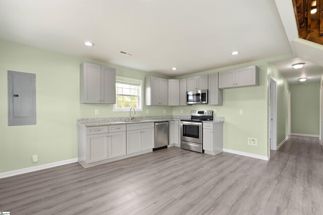 381 Deer Farm Pond Ln, Fair Play, SC 29643 - kitchen featuring light wood finished floors, visible vents, a sink, electric panel, and appliances with stainless steel finishes