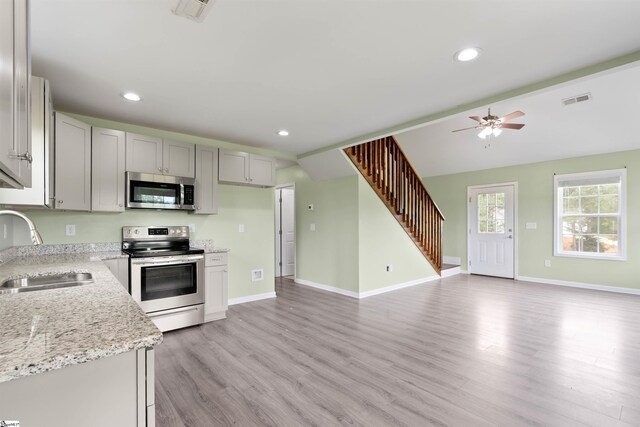 381 Deer Farm Pond Ln, Fair Play, SC 29643 - kitchen with open floor plan, stainless steel appliances, visible vents, and a sink
