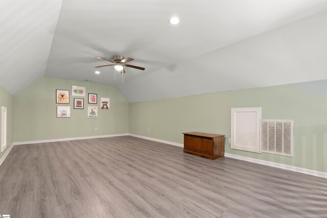381 Deer Farm Pond Ln, Fair Play, SC 29643 - additional living space featuring baseboards, visible vents, lofted ceiling, a ceiling fan, and wood finished floors