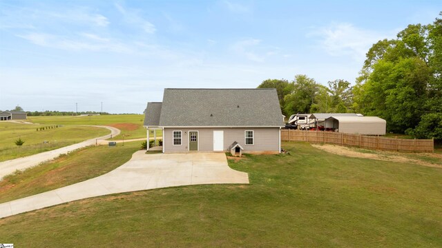381 Deer Farm Pond Ln, Fair Play, SC 29643 - back of property with a yard, a patio, concrete driveway, and fence