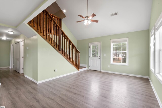 381 Deer Farm Pond Ln, Fair Play, SC 29643 - unfurnished living room featuring stairway, a wealth of natural light, and ceiling fan