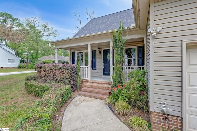 property entrance with a porch and a shingled roof