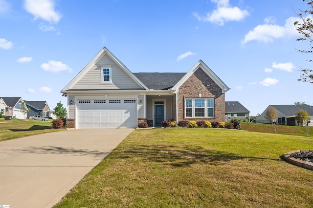 craftsman inspired home featuring brick siding, driveway, a front yard, and a garage