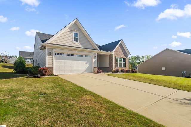 view of front of home with a front lawn, driveway, and brick siding
