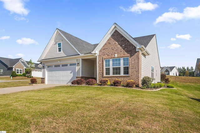 craftsman-style house featuring brick siding, an attached garage, driveway, and a front yard