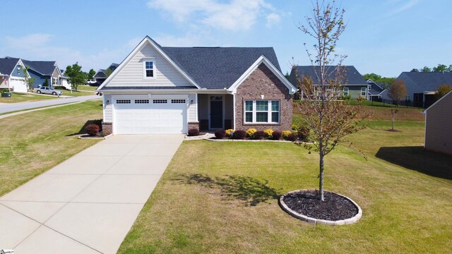 craftsman house with roof with shingles, concrete driveway, a front lawn, brick siding, and a residential view