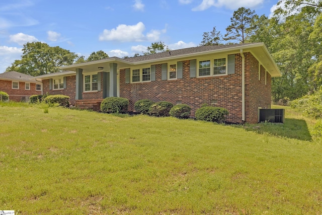 710 Druid Hills Dr, Anderson, SC 29621 - view of front of house with a front lawn, brick siding, and central air condition unit