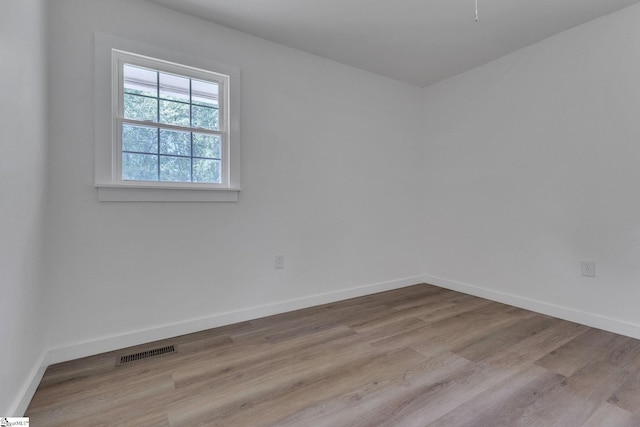 710 Druid Hills Dr, Anderson, SC 29621 - spare room with baseboards, wood finished floors, and visible vents