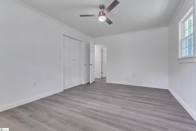 710 Druid Hills Dr, Anderson, SC 29621 - unfurnished bedroom with wood finished floors, a ceiling fan, a closet, crown molding, and baseboards