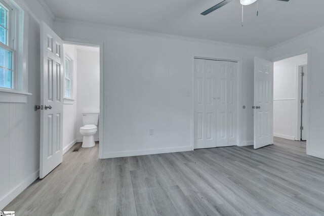 710 Druid Hills Dr, Anderson, SC 29621 - unfurnished bedroom featuring baseboards, light wood-style floors, a closet, connected bathroom, and ornamental molding
