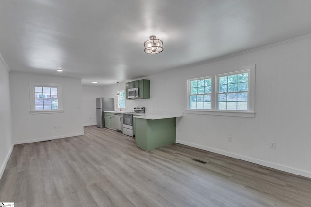 710 Druid Hills Dr, Anderson, SC 29621 - kitchen featuring visible vents, light wood-style flooring, appliances with stainless steel finishes, and green cabinetry