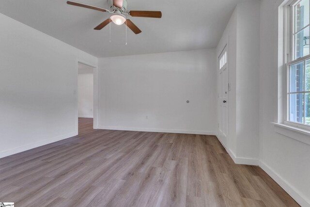 710 Druid Hills Dr, Anderson, SC 29621 - empty room featuring baseboards, a ceiling fan, and light wood finished floors