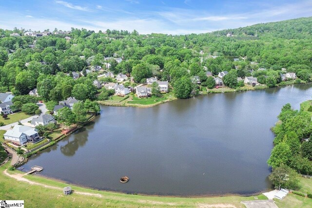 bird's eye view with a residential view and a water view