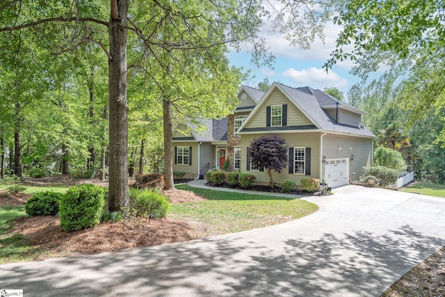 102 Rabon Chase Ct, Fountain Inn, SC 29644 - view of front facade featuring a garage, roof with shingles, a front lawn, and concrete driveway
