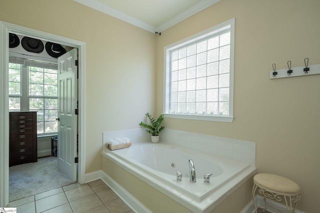 102 Rabon Chase Ct, Fountain Inn, SC 29644 - bathroom featuring ornamental molding, baseboards, a tub with jets, and tile patterned floors