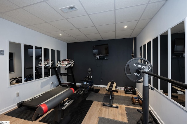 102 Rabon Chase Ct, Fountain Inn, SC 29644 - workout area featuring baseboards, visible vents, wood finished floors, and a paneled ceiling