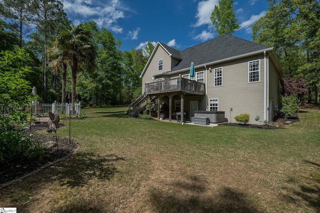 102 Rabon Chase Ct, Fountain Inn, SC 29644 - rear view of property featuring fence, a wooden deck, a hot tub, stairs, and a yard