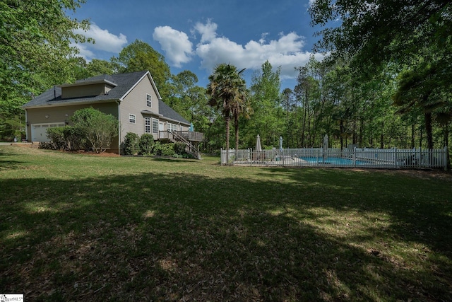 102 Rabon Chase Ct, Fountain Inn, SC 29644 - view of yard featuring a fenced in pool, fence, and a deck