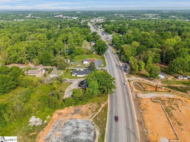 bird's eye view with a view of trees