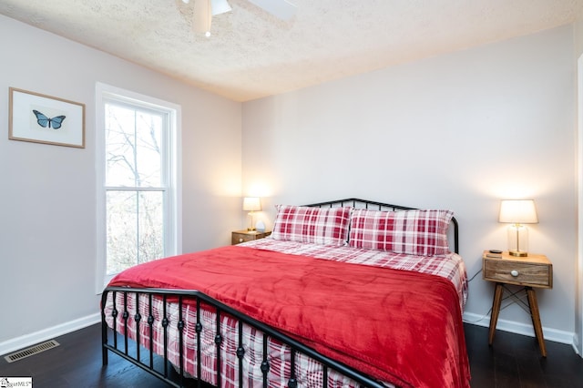 203 W Dr, Travelers Rest, SC 29690 - bedroom featuring a textured ceiling, visible vents, wood finished floors, and baseboards