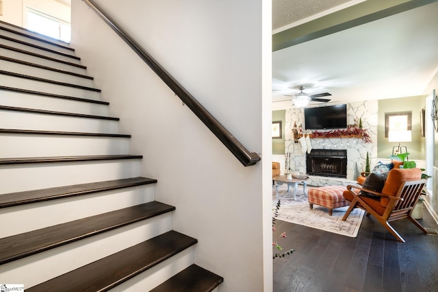 203 W Dr, Travelers Rest, SC 29690 - staircase with a ceiling fan, hardwood / wood-style flooring, and a stone fireplace