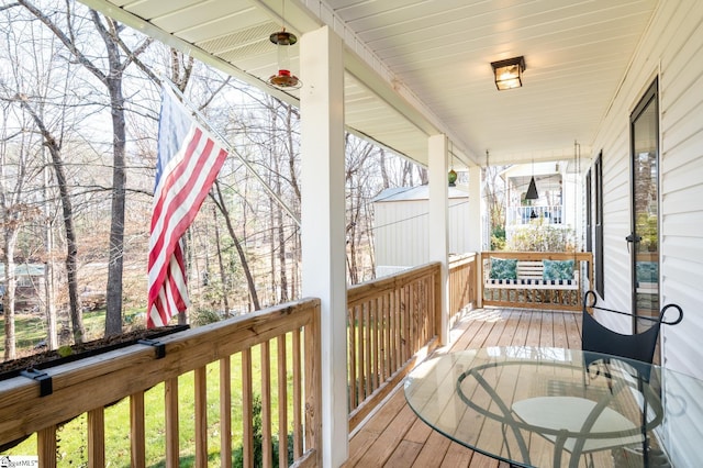 203 W Dr, Travelers Rest, SC 29690 - wooden deck featuring covered porch