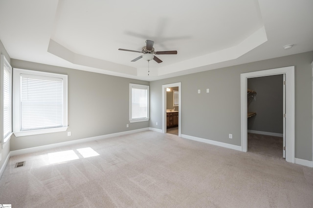 112 Nokota Dr, Pelzer, SC 29669 - unfurnished bedroom featuring carpet flooring, a raised ceiling, visible vents, baseboards, and a spacious closet