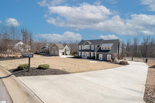 112 Nokota Dr, Pelzer, SC 29669 - view of front facade featuring fence, a porch, and concrete driveway