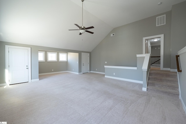 112 Nokota Dr, Pelzer, SC 29669 - unfurnished living room with lofted ceiling, ceiling fan, visible vents, and light carpet