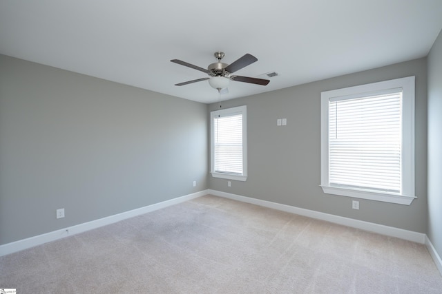 112 Nokota Dr, Pelzer, SC 29669 - unfurnished room featuring visible vents, a ceiling fan, light carpet, and baseboards
