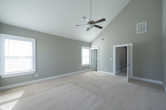 112 Nokota Dr, Pelzer, SC 29669 - unfurnished bedroom featuring visible vents, baseboards, high vaulted ceiling, and light carpet