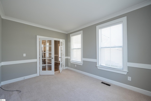 112 Nokota Dr, Pelzer, SC 29669 - carpeted empty room with baseboards, visible vents, french doors, and crown molding