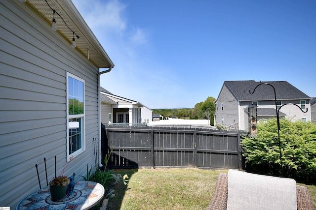 view of yard with fence