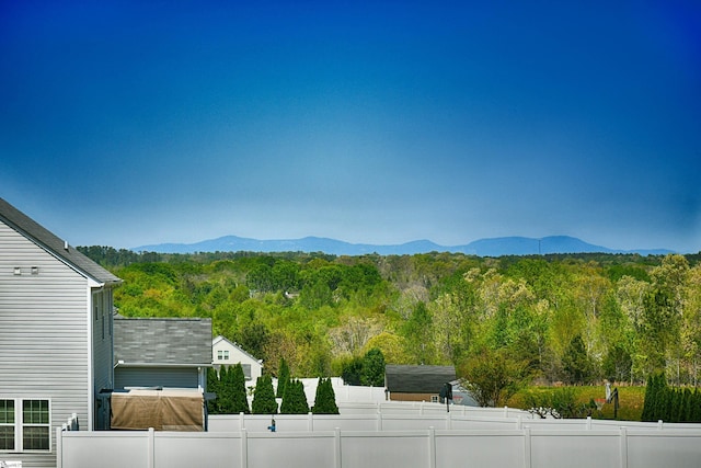 mountain view featuring a view of trees