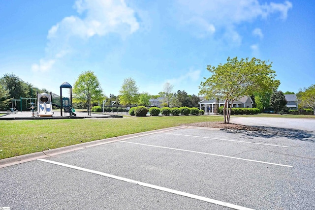 uncovered parking lot featuring playground community