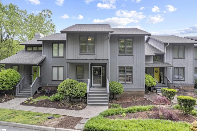 2 Graystone Way, Taylors, SC 29687 - view of front facade with a chimney, a porch, and a shingled roof