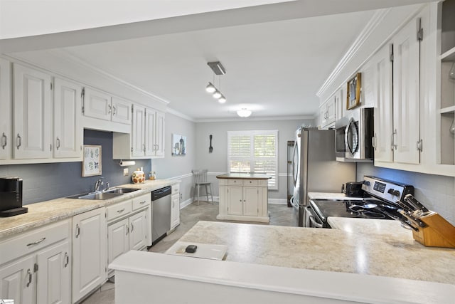 2 Graystone Way, Taylors, SC 29687 - kitchen with a sink, stainless steel appliances, backsplash, white cabinetry, and ornamental molding