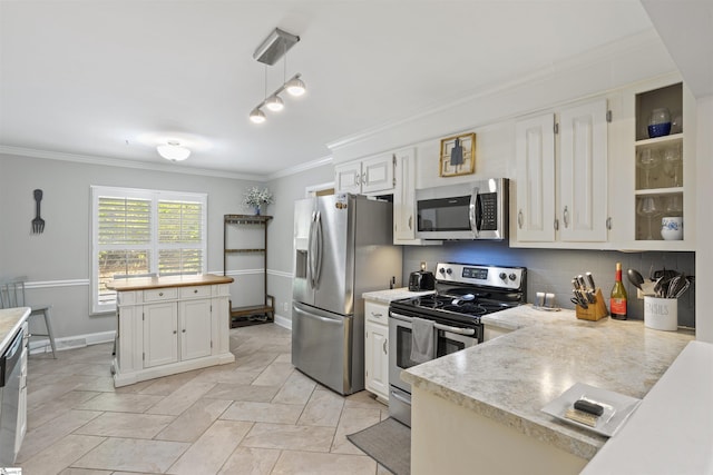 2 Graystone Way, Taylors, SC 29687 - kitchen featuring stainless steel appliances, ornamental molding, and light countertops
