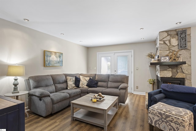 2 Graystone Way, Taylors, SC 29687 - living room with wood finished floors, french doors, a stone fireplace, and baseboards
