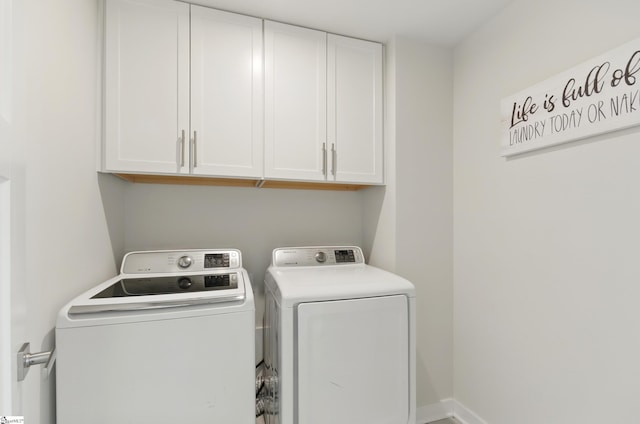 229 Hollythorpe Ln, Fountain Inn, SC 29644 - clothes washing area with cabinet space and washer and clothes dryer