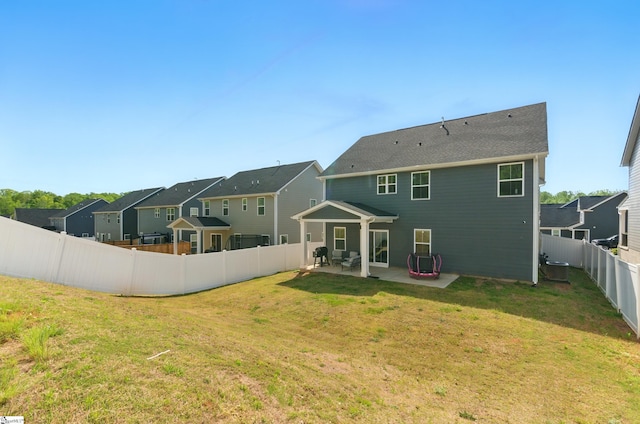 229 Hollythorpe Ln, Fountain Inn, SC 29644 - rear view of property featuring a patio, a fenced backyard, a residential view, and a lawn