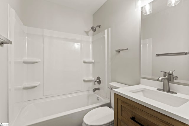 full bathroom featuring toilet, vanity, and shower / bathing tub combination