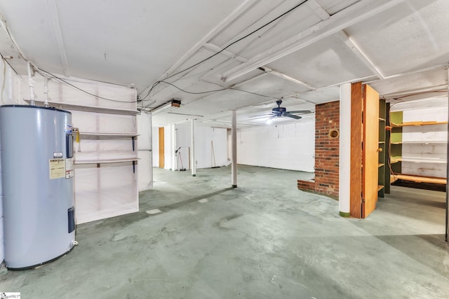 unfinished below grade area featuring electric water heater