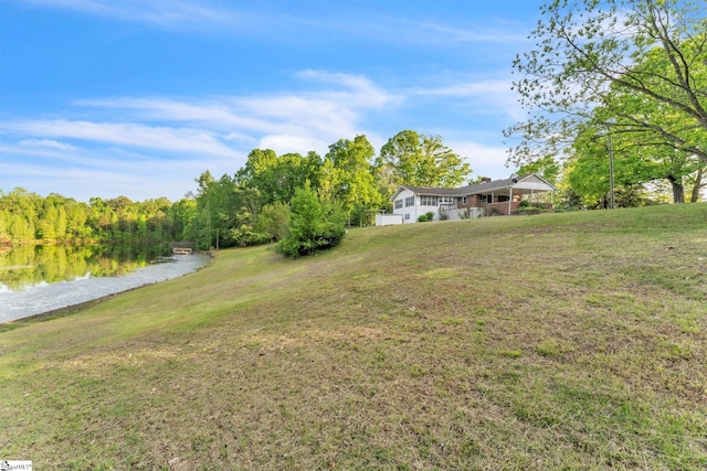 view of yard with a water view